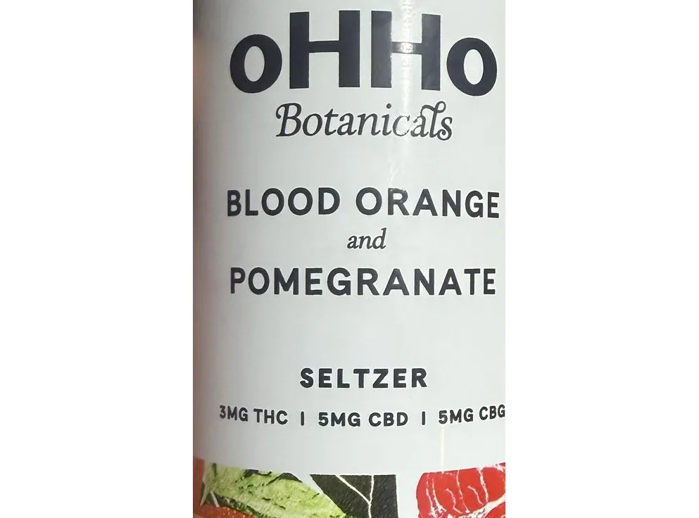 Front of an oHHo Botanicals Blood Orange and Pomegranate seltzer can listing 3mg THC, 5mg CBD, 5mg CBG